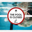 Underwater view of man swimming laps in an olympic pool