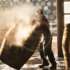 Male cooper working in cooperage with whisky casks